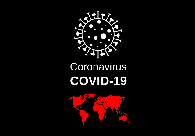 COVID-19の文字とウイルスのイラストと世界地図